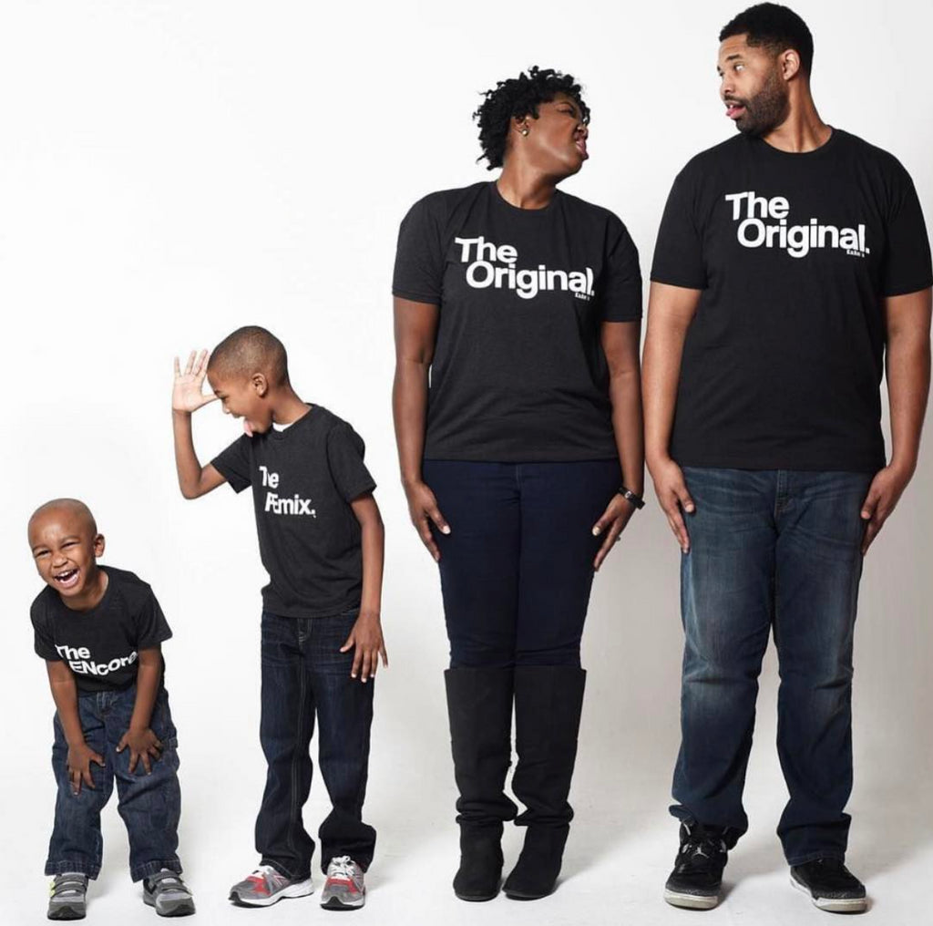 family of four posing with goofy faces and body language behind a white back drop for a cute family photo moment