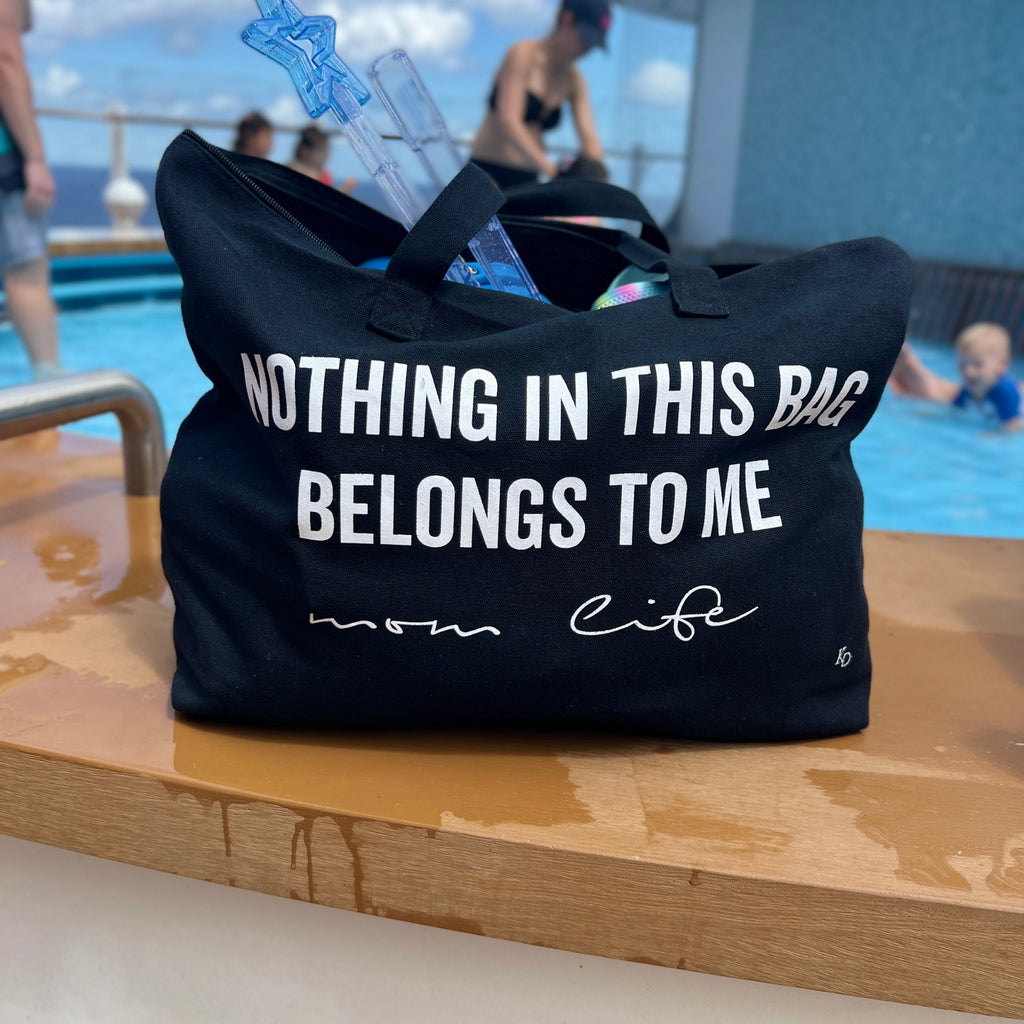 disney vacation trip with tote bag with the color black at the disney cruise wish vacation