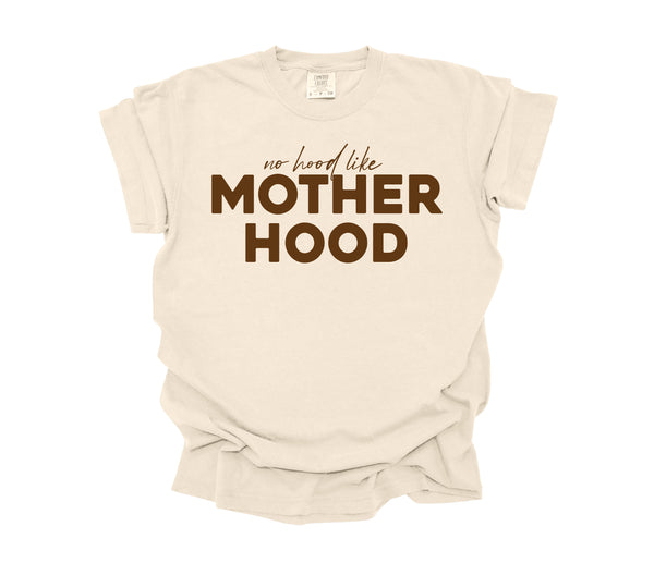 graphic comfort colors shirt with text that says no hood like motherhood.