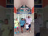 family all dancing in front of castaway bay indoor water park with dad wearing his dad. sweatshirt pullover