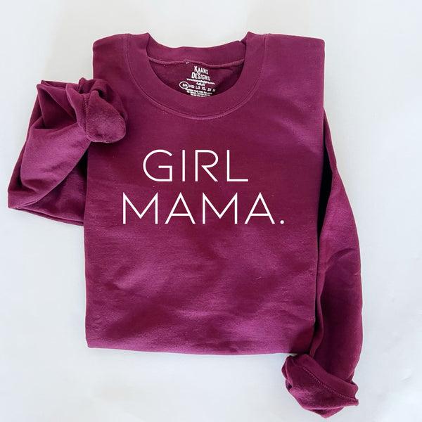 flat lay of a maroon pullover sweatshirt with design screen print that says girl mama pullover