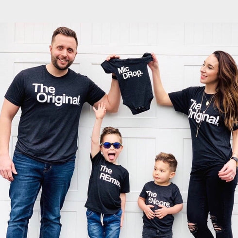matching couples shirt for pregnancy matching outfits, family in front of garage announcing new baby